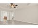 Spacious bedroom features a tray ceiling with fan and access to bathroom and kitchen at 625 Lorimore Pass, Canton, GA 30115