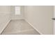 Walk-in closet provides ample storage with wire shelving and natural light at 625 Lorimore Pass, Canton, GA 30115