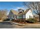 Charming clubhouse with inviting front porch and manicured landscaping at 625 Lorimore Pass, Canton, GA 30115