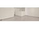 Living room space with neutral walls and flooring, ready for your personal touch at 625 Lorimore Pass, Canton, GA 30115