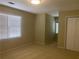 Spacious bedroom with carpet, closet, and large window at 863 Fairwood Pointe Nw, Acworth, GA 30101