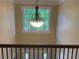 Foyer with chandelier and wood banister at 863 Fairwood Pointe Nw, Acworth, GA 30101