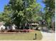 Charming home featuring a lush landscaped yard and a convenient two-car garage, inviting curb appeal at 863 Fairwood Pointe Nw, Acworth, GA 30101