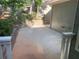 A concrete patio area with retaining wall that offers a perfect space for outdoor gatherings at 863 Fairwood Pointe Nw, Acworth, GA 30101
