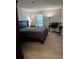 Spacious bedroom with stylish decor, musical instruments, and a dedicated workstation, blending comfort with creative space at 1504 Augusta Se Dr, Marietta, GA 30067