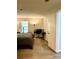 Bright bedroom featuring a workspace with speakers, a window, and a glimpse of comfortable living, all in one space at 1504 Augusta Se Dr, Marietta, GA 30067