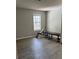 A flexible room with a clean window for natural light, suitable for use as an office, gym, or hobby space at 1504 Augusta Se Dr, Marietta, GA 30067