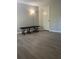 A flexible room with clean lines and vinyl flooring; ideal for use as a personal gym, office, or spare room at 1504 Augusta Se Dr, Marietta, GA 30067