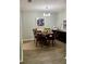 Dining room features wood floors, a round table, four chairs, and modern lighting at 1504 Augusta Se Dr, Marietta, GA 30067