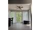 Sunlit dining area with large windows, sheer curtains, and views of the outdoor greenery at 1504 Augusta Se Dr, Marietta, GA 30067