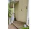 View of the exterior stairs leading to the upper levels of the condo with beige siding at 1504 Augusta Se Dr, Marietta, GA 30067