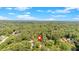 Aerial view of a wooded lot featuring tree coverage with a pin on the property at 1728 Line St, Decatur, GA 30032