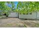 The backyard features a concrete patio surrounded by a yard at 1728 Line St, Decatur, GA 30032