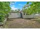 Backyard featuring a concrete patio surrounded by a yard at 1728 Line St, Decatur, GA 30032