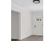 Bright entryway with a glass-paneled front door, modern flooring, and neutral walls for a clean, welcoming ambiance at 1728 Line St, Decatur, GA 30032