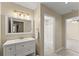 Well-lit bathroom featuring a vanity with storage, providing a comfortable and functional space at 208 Bainbridge Dr, Atlanta, GA 30327