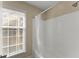Clean and functional bathroom with a tub and shower featuring a shower curtain and ample natural light at 208 Bainbridge Dr, Atlanta, GA 30327