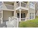 Desirable condo with double balconies, featuring well maintained walkway and lush landscaping at 208 Bainbridge Dr, Atlanta, GA 30327