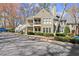 Inviting condo featuring a traditional design, tidy landscaping, and a tranquil neighborhood setting at 208 Bainbridge Dr, Atlanta, GA 30327