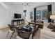Bright living room with chic furnishings, including plush sofas, stylish chairs, and contemporary accents at 946 Hughley Circle # 98, Atlanta, GA 30316