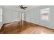 Spacious bedroom featuring hardwood floors, a ceiling fan, and plenty of natural light at , Tucker, GA 30084