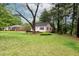 Charming home with a well-kept lawn and beautiful trees in a serene setting at , Tucker, GA 30084