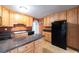 Functional kitchen featuring ample cabinet space, modern appliances, and tiled floors at , Tucker, GA 30084