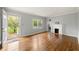 Bright living room featuring hardwood floors, a fireplace, and plenty of natural light at , Tucker, GA 30084