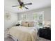 Cozy bedroom with neutral colors, plush bedding and decorative accents at 1151 Goodwin Ne Rd, Brookhaven, GA 30324