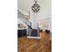 Grand foyer with hardwood floors, high ceilings, elegant chandelier, and staircase at 1151 Goodwin Ne Rd, Brookhaven, GA 30324