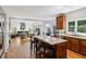 Open concept kitchen featuring a large island with seating and hardwood floors at 1151 Goodwin Ne Rd, Brookhaven, GA 30324