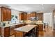 Spacious kitchen with granite countertops, stainless steel appliances and custom wood cabinets at 1151 Goodwin Ne Rd, Brookhaven, GA 30324