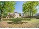 Spacious backyard featuring a deck, walkout basement, and wooden fence at 1356 Belfaire Trce, Dacula, GA 30019