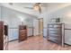 Bedroom with wood floors, a ceiling fan, and neutral grey paint at 1356 Belfaire Trce, Dacula, GA 30019
