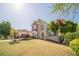 Charming two-story home featuring a well-manicured lawn and beautiful landscaping at 1356 Belfaire Trce, Dacula, GA 30019