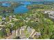 Breathtaking aerial view showcasing the property's prime location near a serene lake at 1420 Lockridge Dr, Cumming, GA 30041