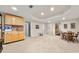 Large carpeted basement with recessed lighting, wet bar, and entertainment space at 1420 Lockridge Dr, Cumming, GA 30041