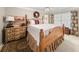 Inviting bedroom with a wood bed frame, decorative accents and natural light at 1420 Lockridge Dr, Cumming, GA 30041