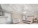 Bright bedroom featuring tray ceilings and neutral colors, creating a cozy and inviting atmosphere at 1420 Lockridge Dr, Cumming, GA 30041