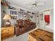 Cozy bonus room featuring a leather recliner and sports memorabilia at 1420 Lockridge Dr, Cumming, GA 30041