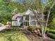 Beautiful two story home with a manicured front yard and a welcoming facade at 1420 Lockridge Dr, Cumming, GA 30041