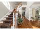 Grand foyer with hardwood flooring, staircase, and decorative accents at 1420 Lockridge Dr, Cumming, GA 30041