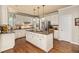 Well-equipped kitchen with center island, granite countertops, and ample storage at 1420 Lockridge Dr, Cumming, GA 30041