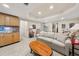 Finished basement featuring a kitchenette, comfortable seating, and a relaxed atmosphere at 1420 Lockridge Dr, Cumming, GA 30041