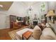 Spacious living room with high ceilings, fireplace, and ample seating at 1420 Lockridge Dr, Cumming, GA 30041