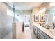 Spa-like bathroom with double vanity and a glass-enclosed walk-in shower at 4725 Montane St, Cumming, GA 30028