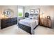 Comfortable bedroom with a gray color scheme, stylish decor, and lots of natural light at 4725 Montane St, Cumming, GA 30028