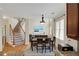 Dining area showcasing easy access to the living room and staircase at 5177 Cabot Creek Dr, Buford, GA 30518