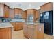 Well-equipped kitchen boasts stainless steel appliances, granite countertops, and ample cabinet space at 5177 Cabot Creek Dr, Buford, GA 30518