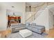 Open-concept living area showcasing hardwood floors and a view of the staircase at 5177 Cabot Creek Dr, Buford, GA 30518